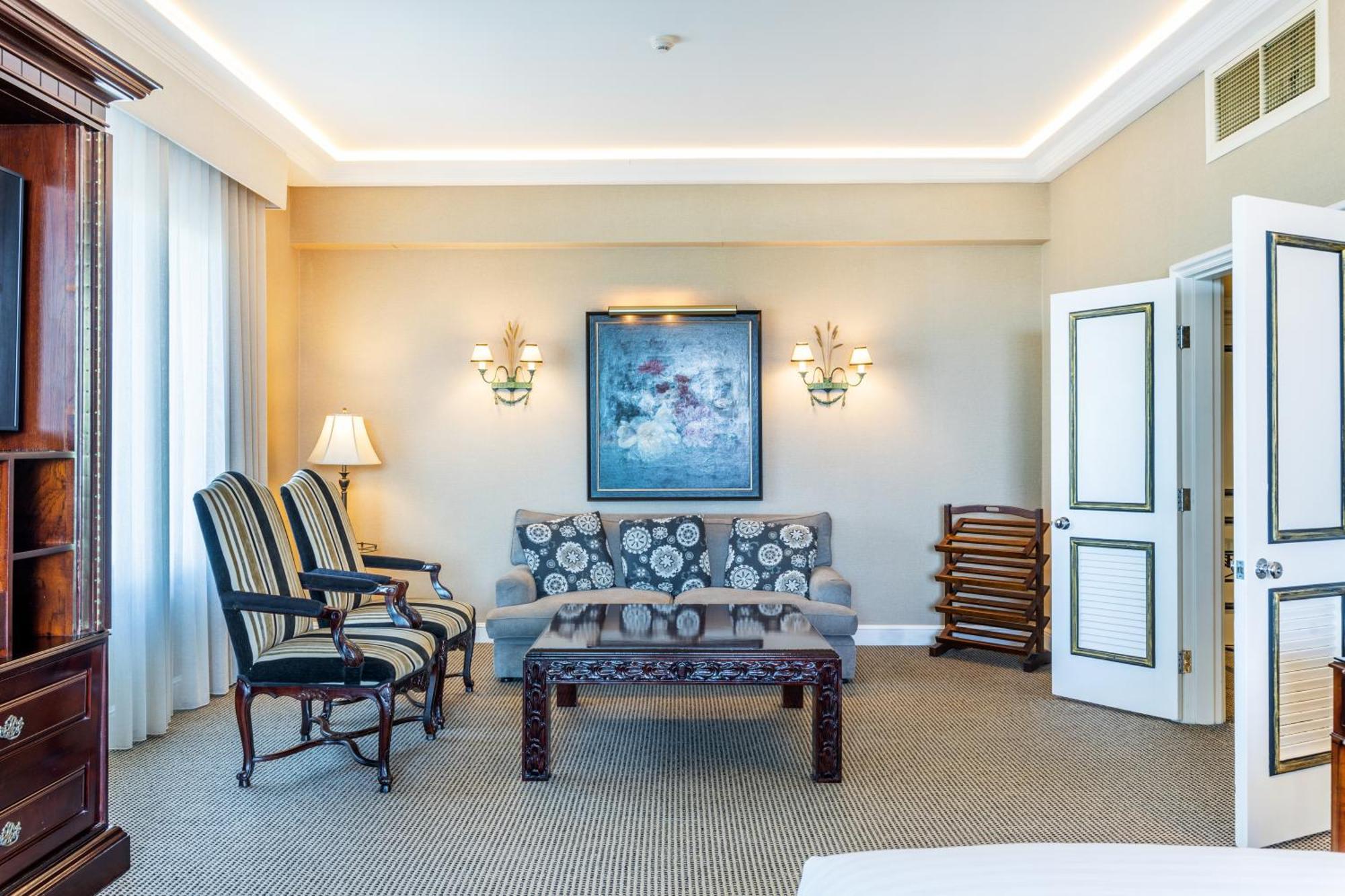 โรงแรมสแตมฟอร์ดพลาซ่าบริสเบน ภายนอก รูปภาพ A living room at the Inn